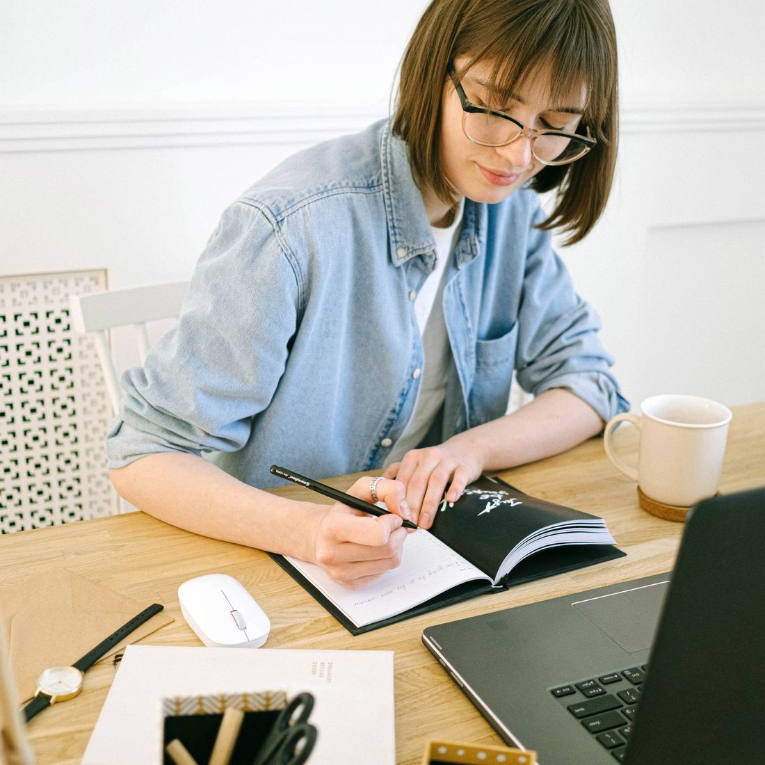 An author writing her book